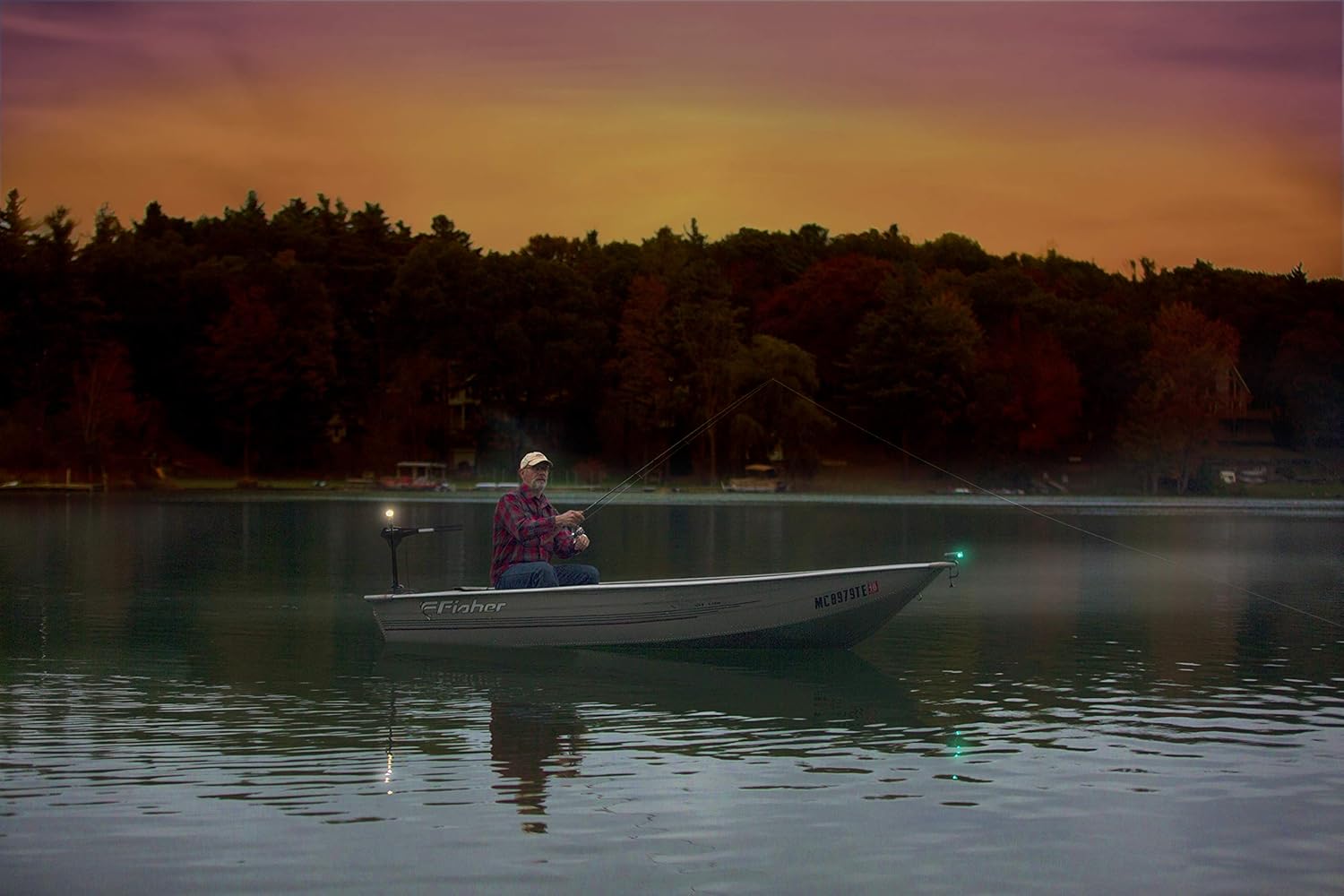 boat-with-lights-and-fisherman